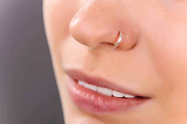 Nose piercing falling out while sleeping - steps to reinsert the jewelry
